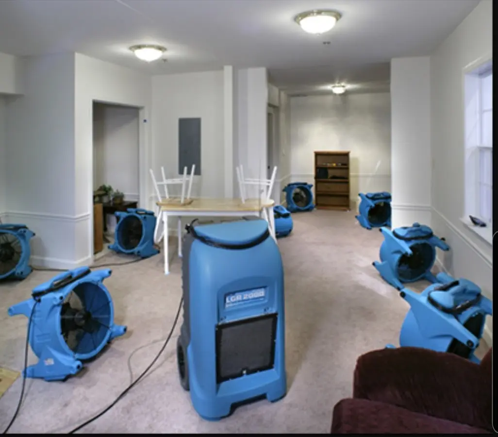 Air movers and dehumidifier setup for Water Damage Restoration in Jackson